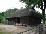 Lithuanian log cabin with thatched roof